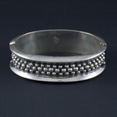 Circle with Embedded Silver Marbles