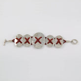 Ovals Tied with Leather Straps