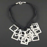 Squares Tied with Leather Straps