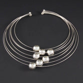 Wires with Silver Marbles