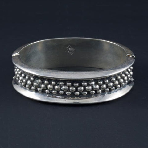 Circle with Embedded Silver Marbles