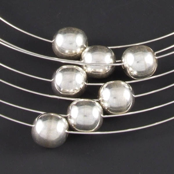 Wires with Silver Marbles